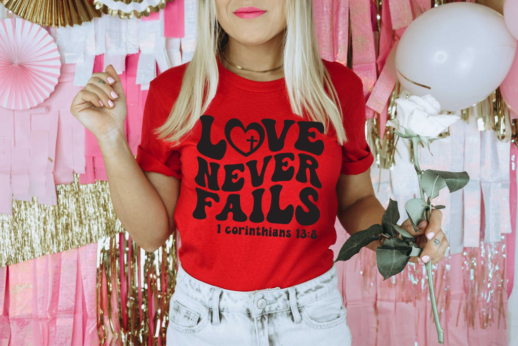 Love Never Fails Unisex Graphic Tee